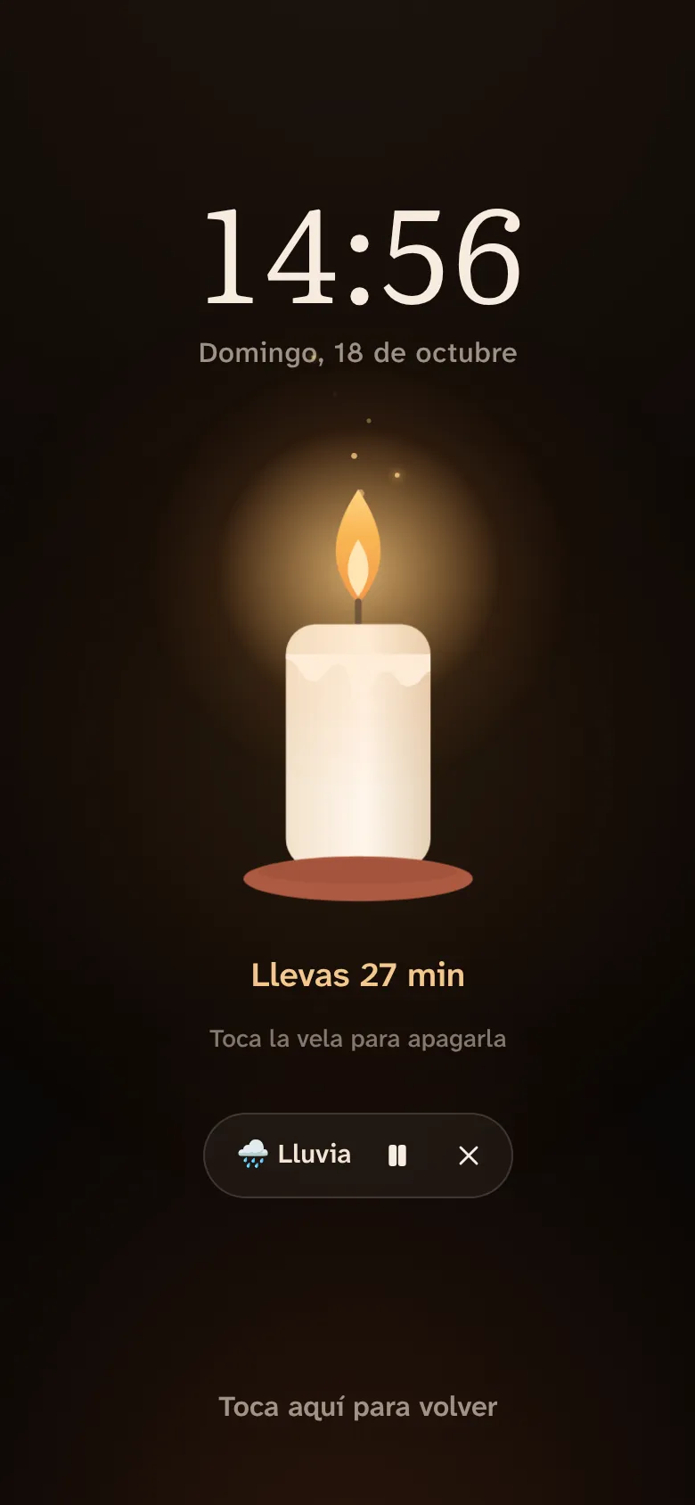 Modo vela: pantalla oscura con la hora y una vela encendida